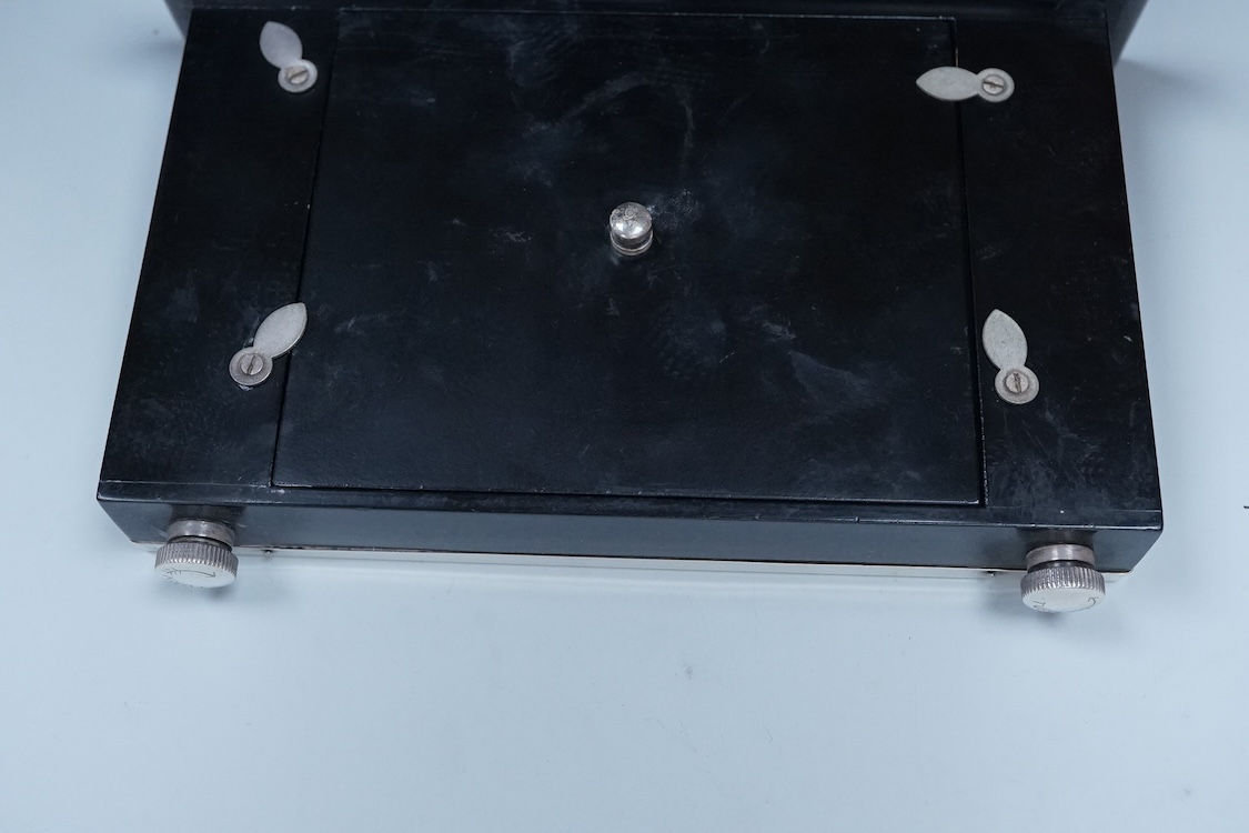 Two modern silver mounted ebonised desk calendars, including one retailed by Asprey, width 21.3cm and a modern silver mounted photograph frame.